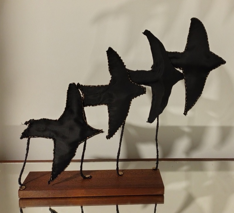 Swifts in flight by Lesley Bright